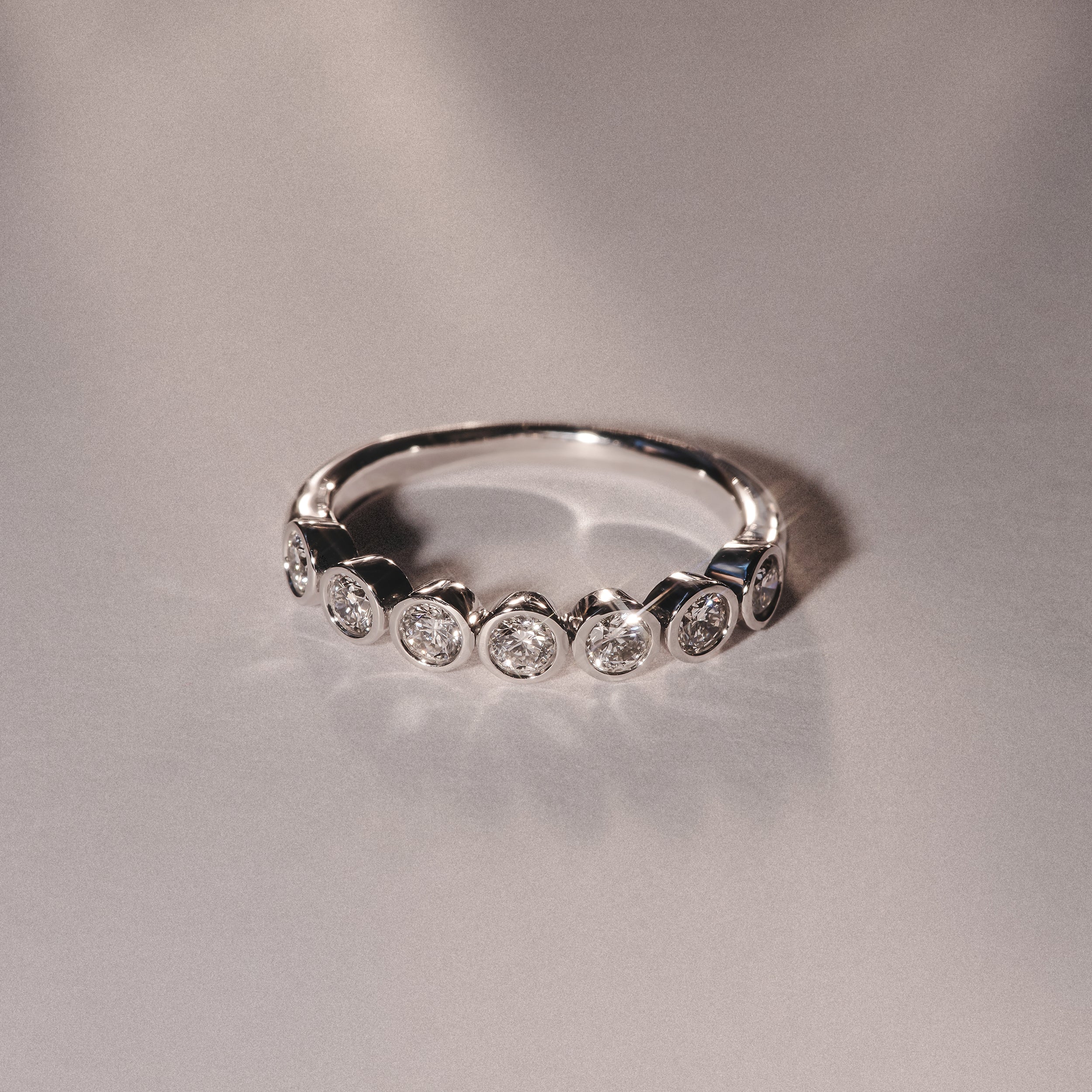 Orbit Half Band 0.15ct F/VS Round Cut Rubover Eternity Ring in Sterling Silver